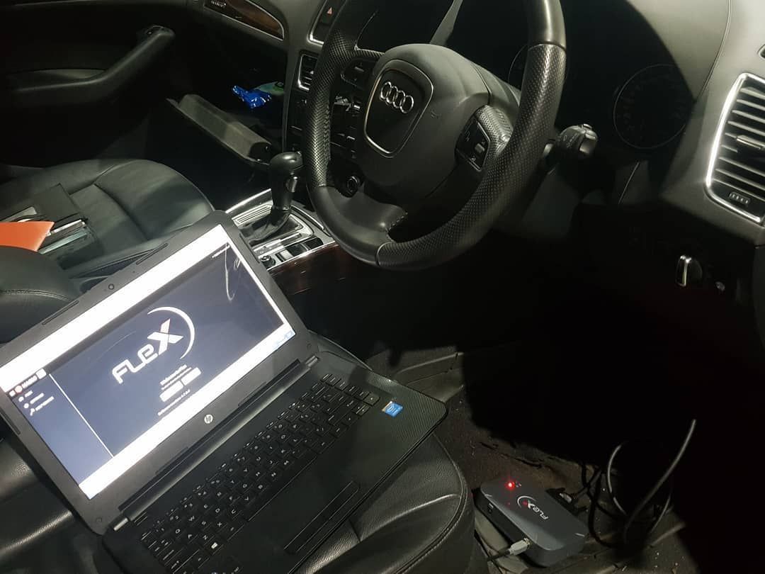A Laptop Is Sitting in The Driver 's Seat of A Car — Latin Motors in Fyshwick, ACT