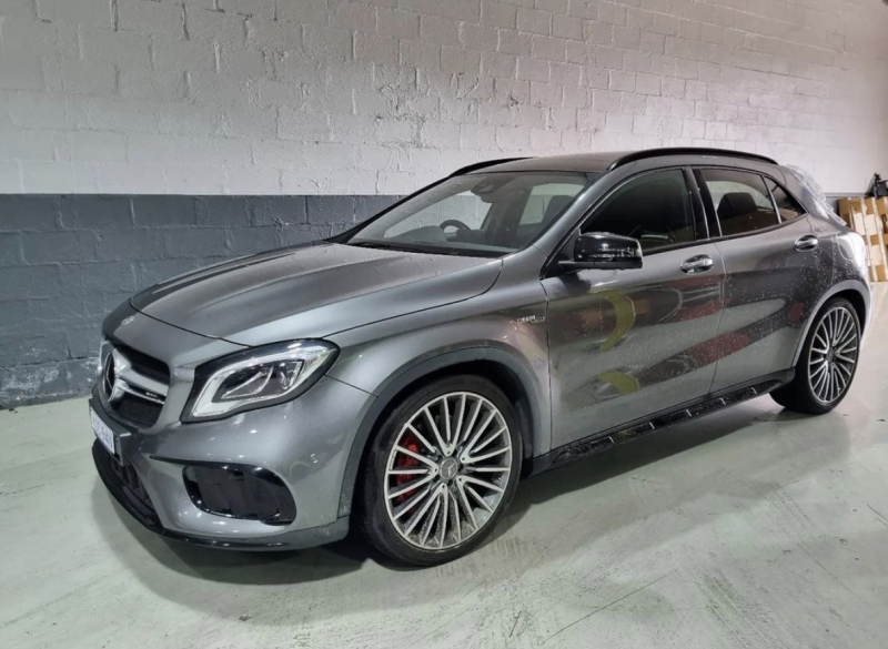 A Mercedes Benz Gla 45 Amg Is Parked in A Garage — Latin Motors in Queanbeyan, ACT