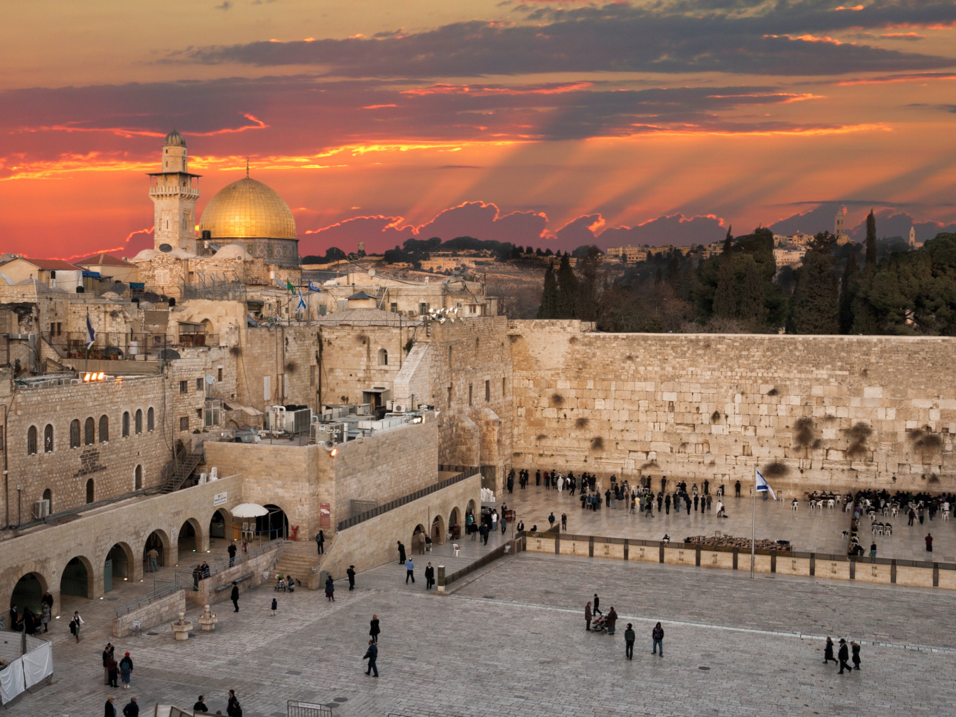 An aerial view of the western wall in jerusalem at sunset.