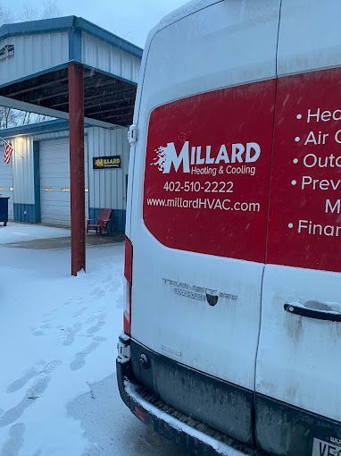 Technician Checking Air Conditioning Operation — Omaha, NE — Millard Heating & Cooling
