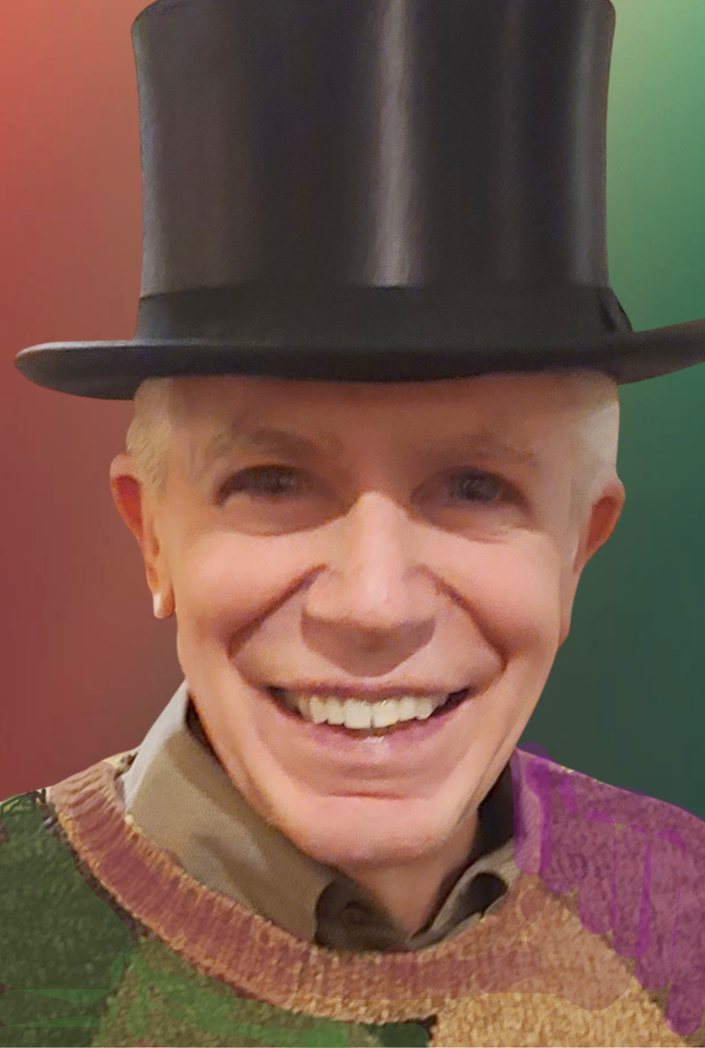 Man in top hat smiles, wearing a colorful sweater; red and green background.