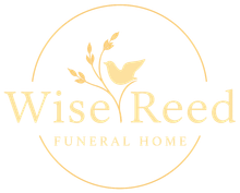 WiseReed Funeral Home logo in gold with bird and floral branches inside a thin circle