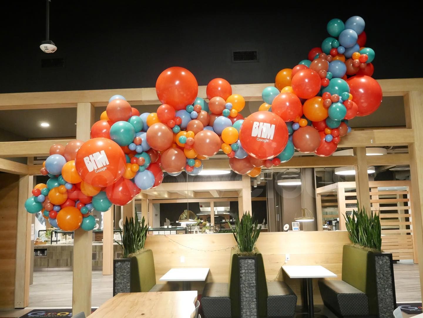 orange and blue balloon garland