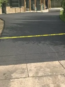 Asphalt paved driveway, Allstate Paving.