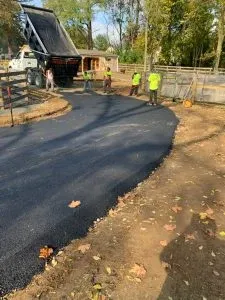Asphalt paving in progress, driveway, Allstate Paving.