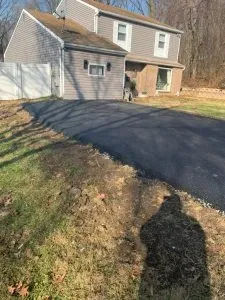 Asphalt paved driveway, Allstate Paving.