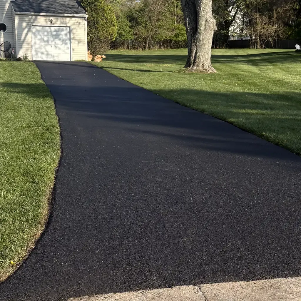 Asphalt driveway paving by Allstate Paving of PA in Downingtown, Villanova, and West Chester areas.
