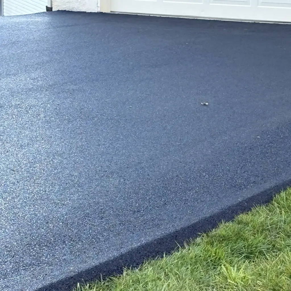 Asphalt driveway installation by Allstate Paving of PA in Downingtown, Villanova, and West Chester, Pennsylvania.