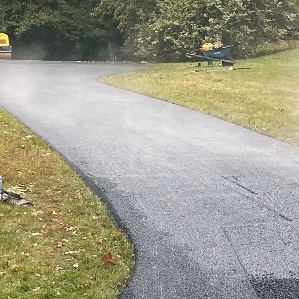 Professional asphalt driveway paving by Allstate Paving of PA in Downingtown, Villanova, and West Chester areas.