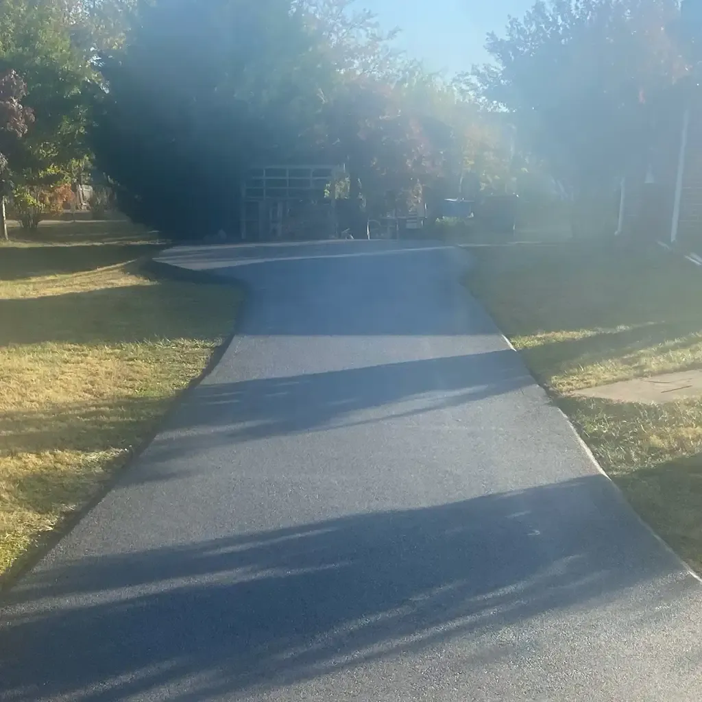 New asphalt driveway paved by Allstate Paving of PA for properties in Downingtown, Villanova, and West Chester.