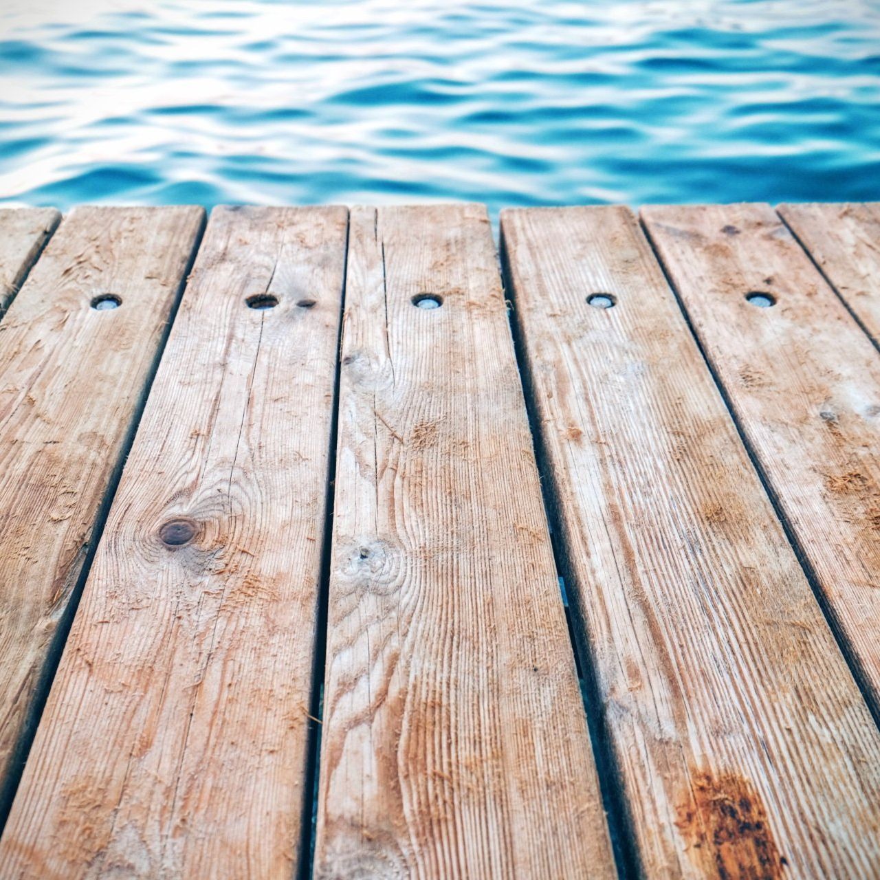 A wooden dock overlooking a body of water