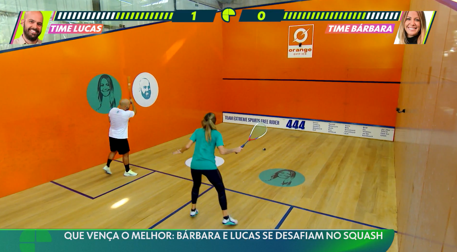 A man and a woman are playing squash on a court.