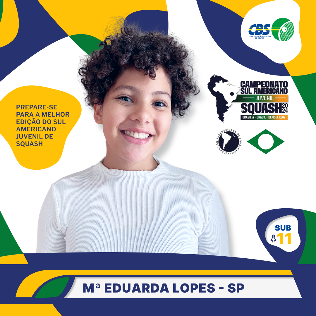 Um menino de cabelos cacheados sorri para a câmera