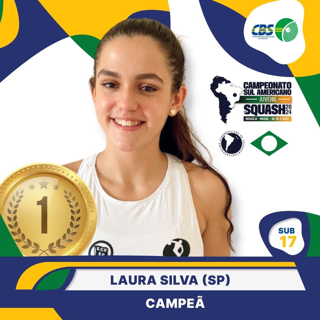 Uma garota com uma medalha que diz laura silva nela