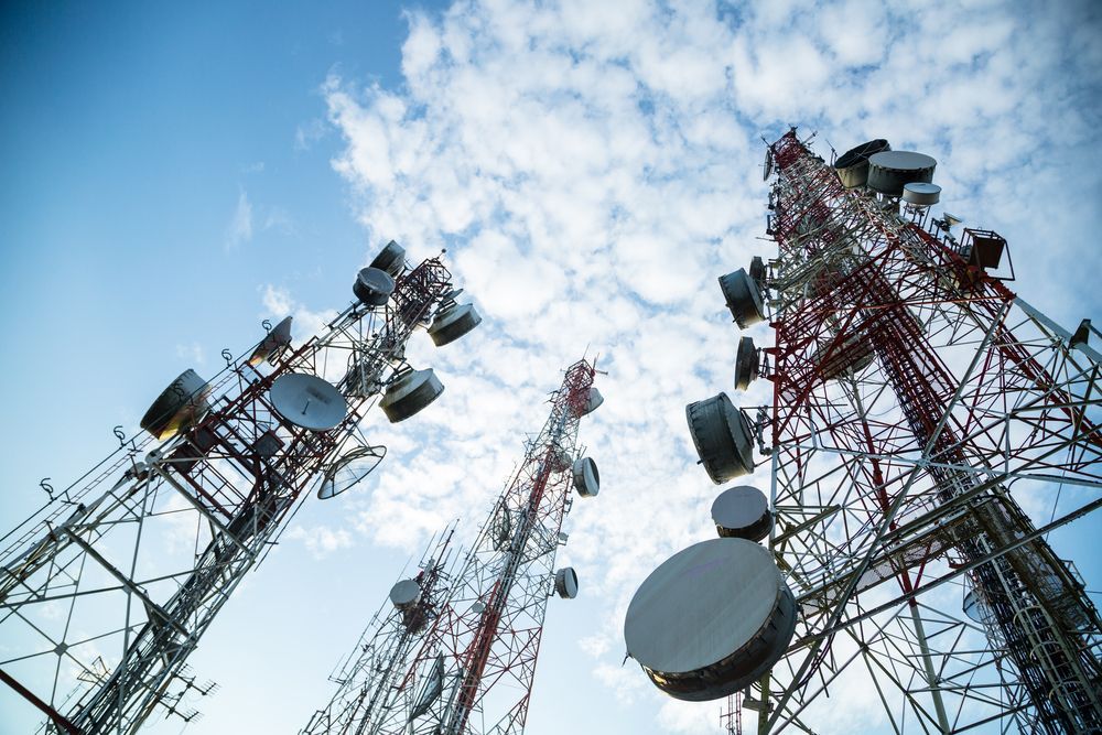 three large metal microwave links — Capricorn Communications in Kawana, QLD