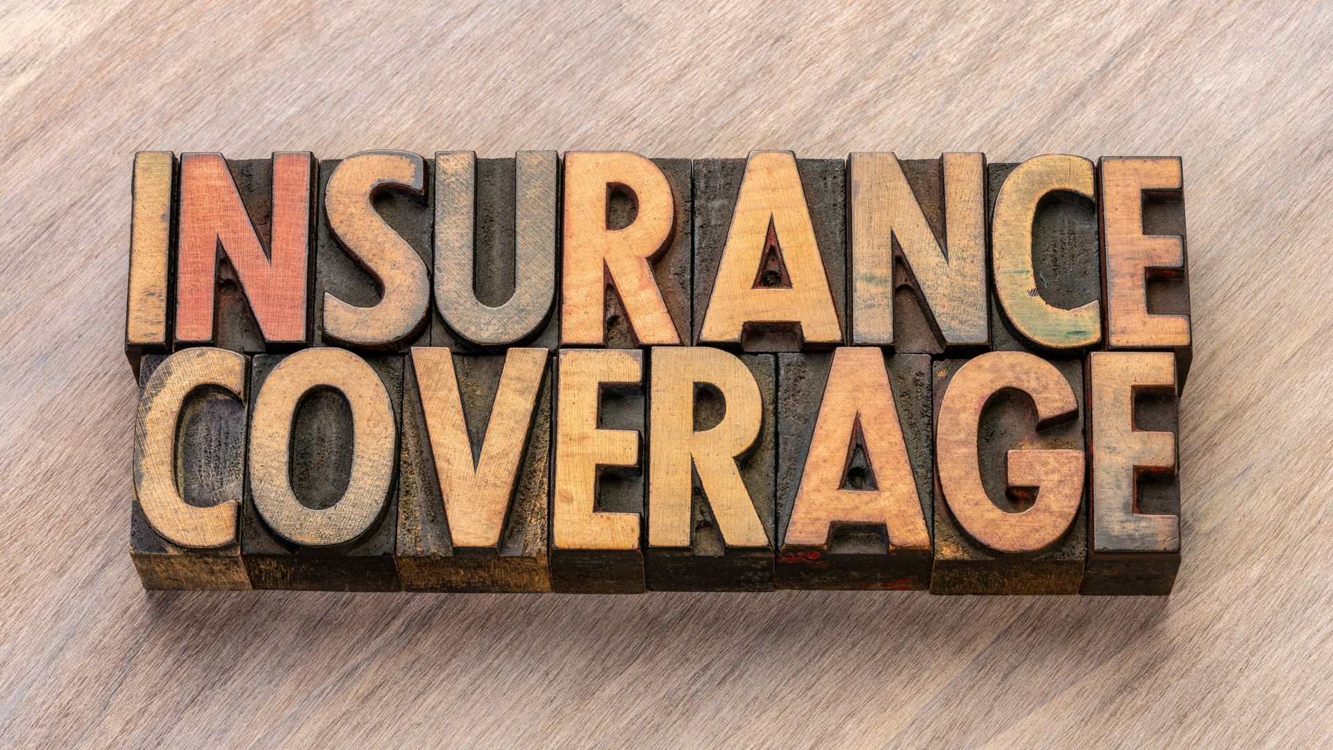 Insurance coverage in vintage letterpress wood type blocks