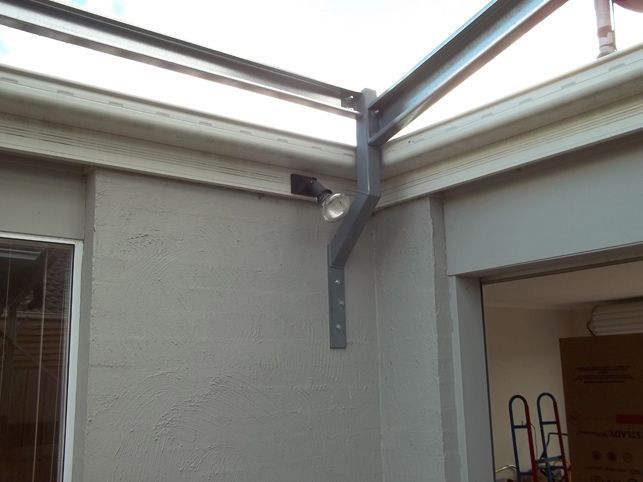 A light is hanging from the ceiling of a building