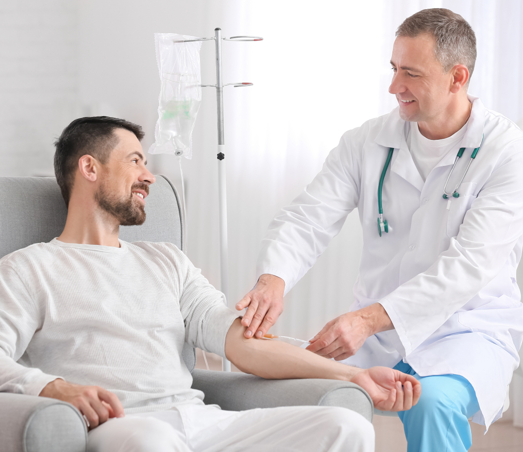 A doctor is giving a patient an injection in his arm.