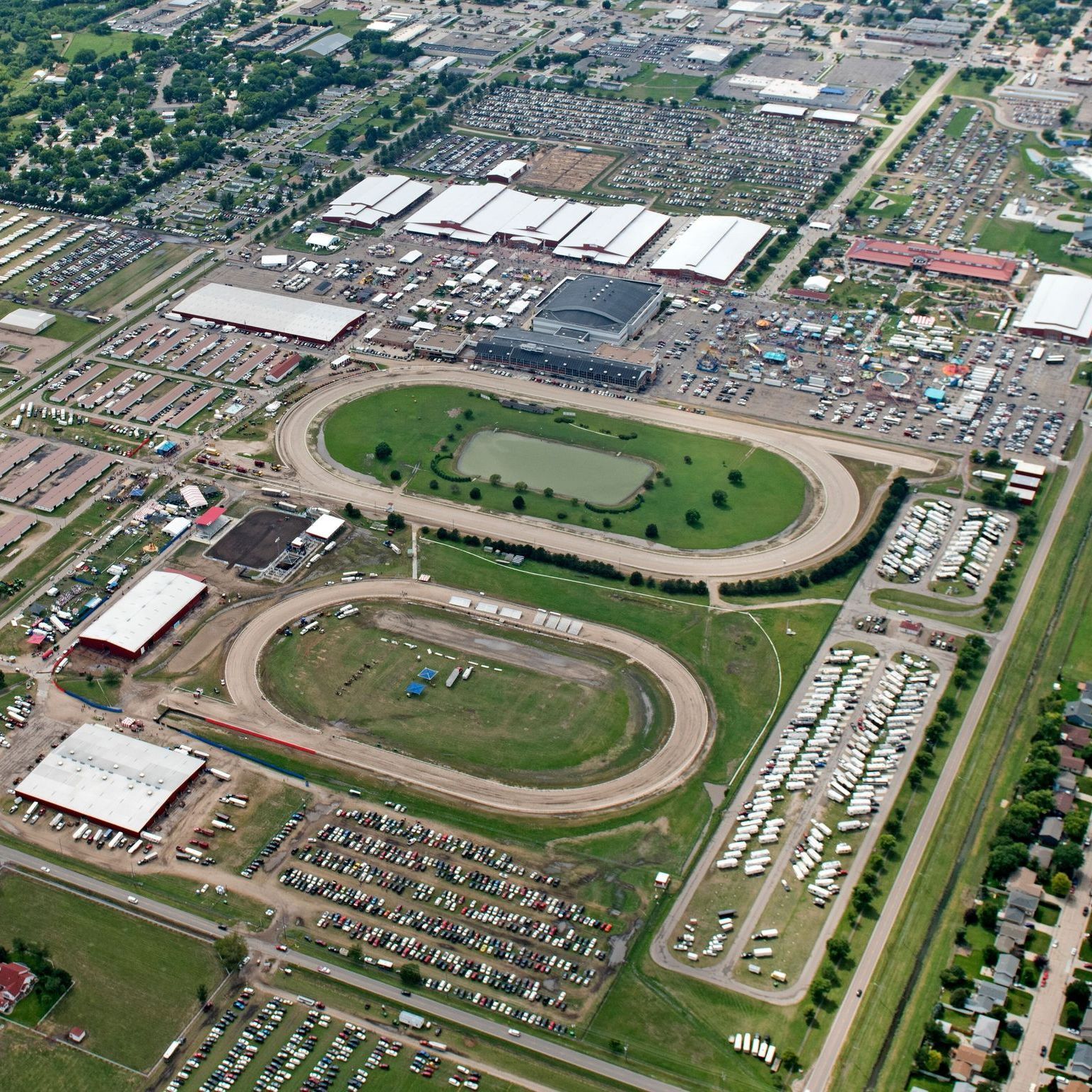 An aerial view of a race track in a city