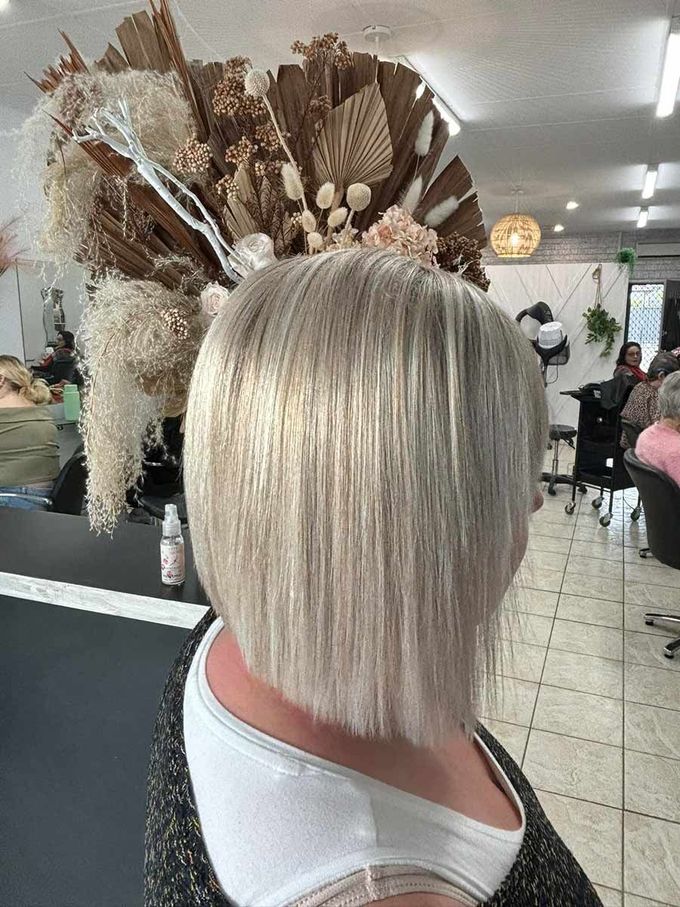 A Woman With Blonde Hair In A Salon — Janine Wellings Hair Art In Belmont, NSW