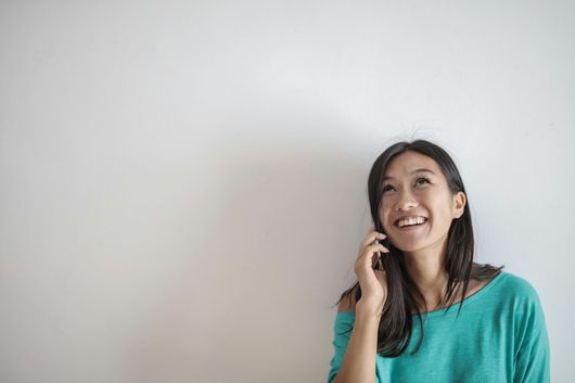 Woman calling for glass replacement in Auckland