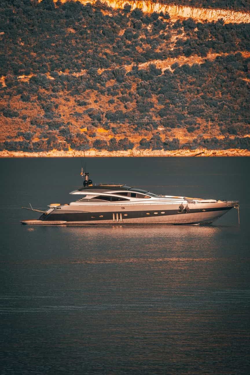 classy yacht achored in bay- Boat Transport done