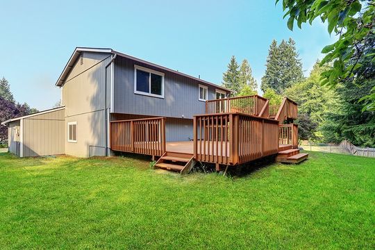 a house with wooden deck