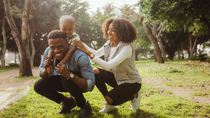 Family Playing in Park
