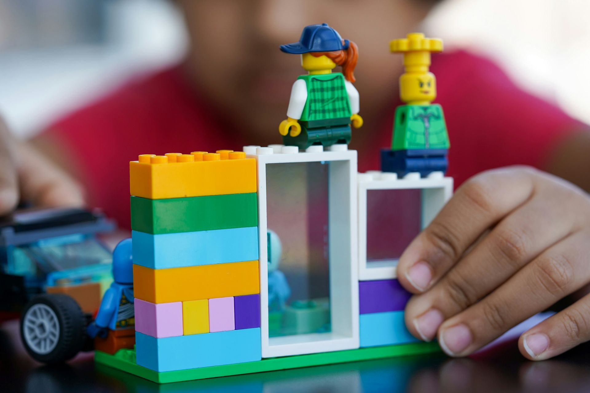Child building confidence with blocks