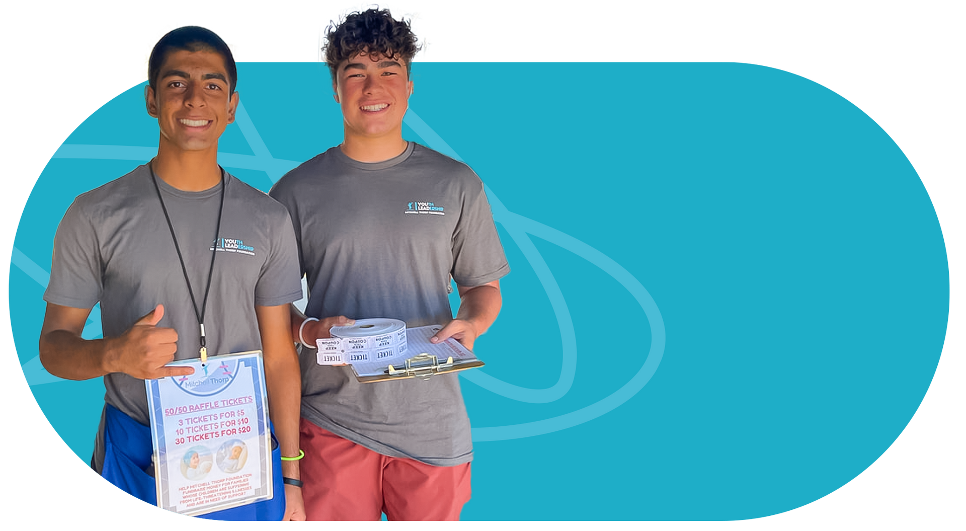 Two young men smiling, holding papers and circuit boards, standing against a teal background.