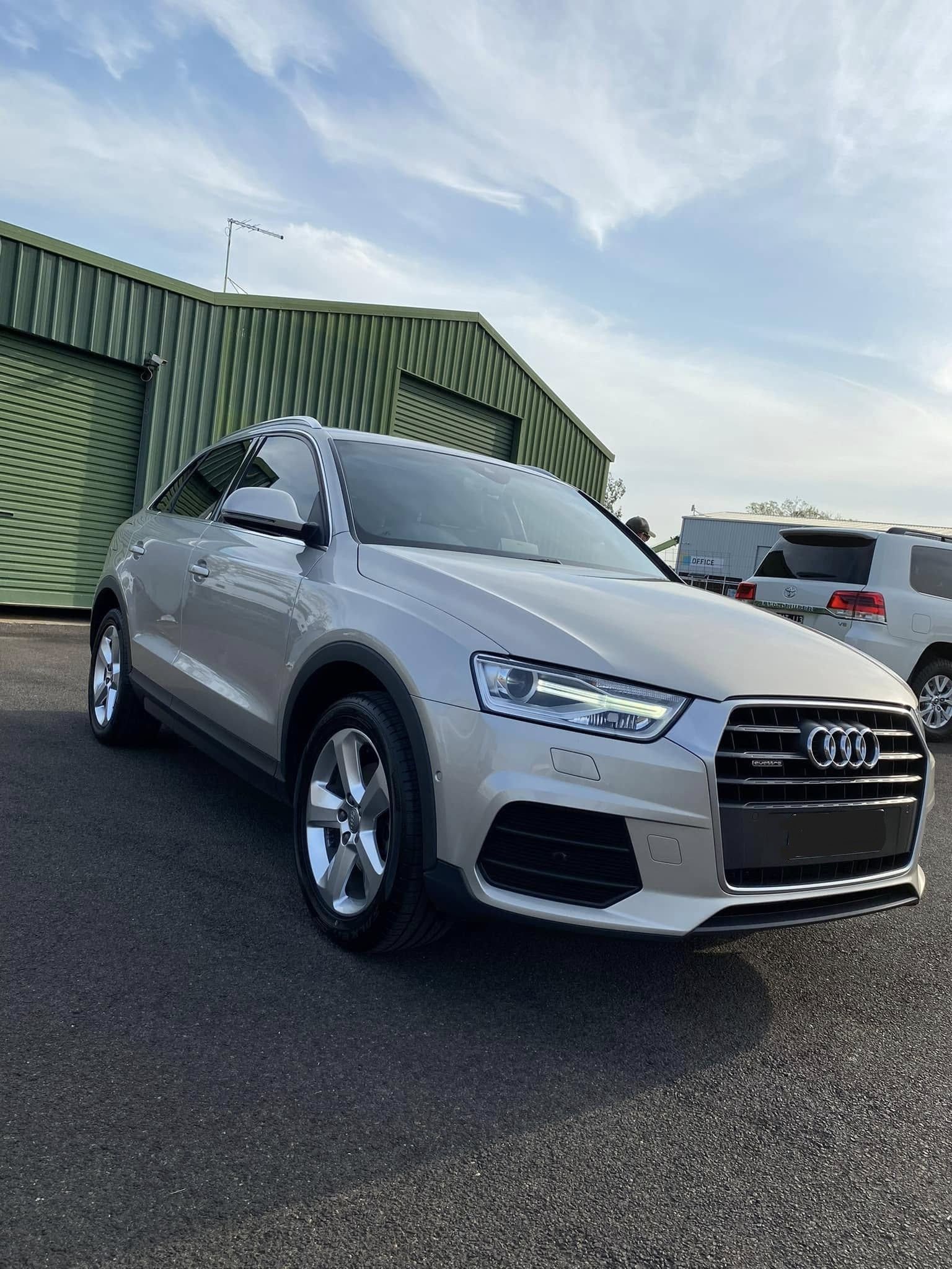 Silver Audi Q3 Suv Parked on Asphalt in Front of a Green Building on a Sunny Day — Beclean Auto Detailing in Mareeba, QLD