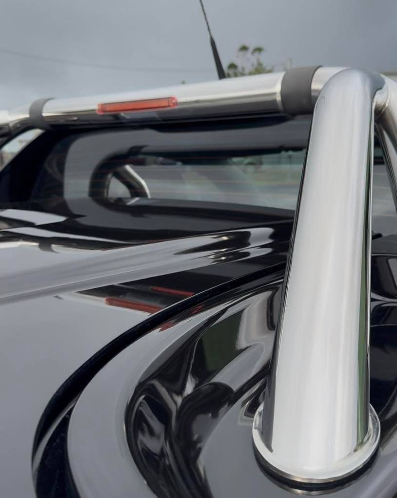 Close-Up of A Black Pickup Truck with A Silver Roll Bar — Beclean Auto Detailing in Mareeba, QLD