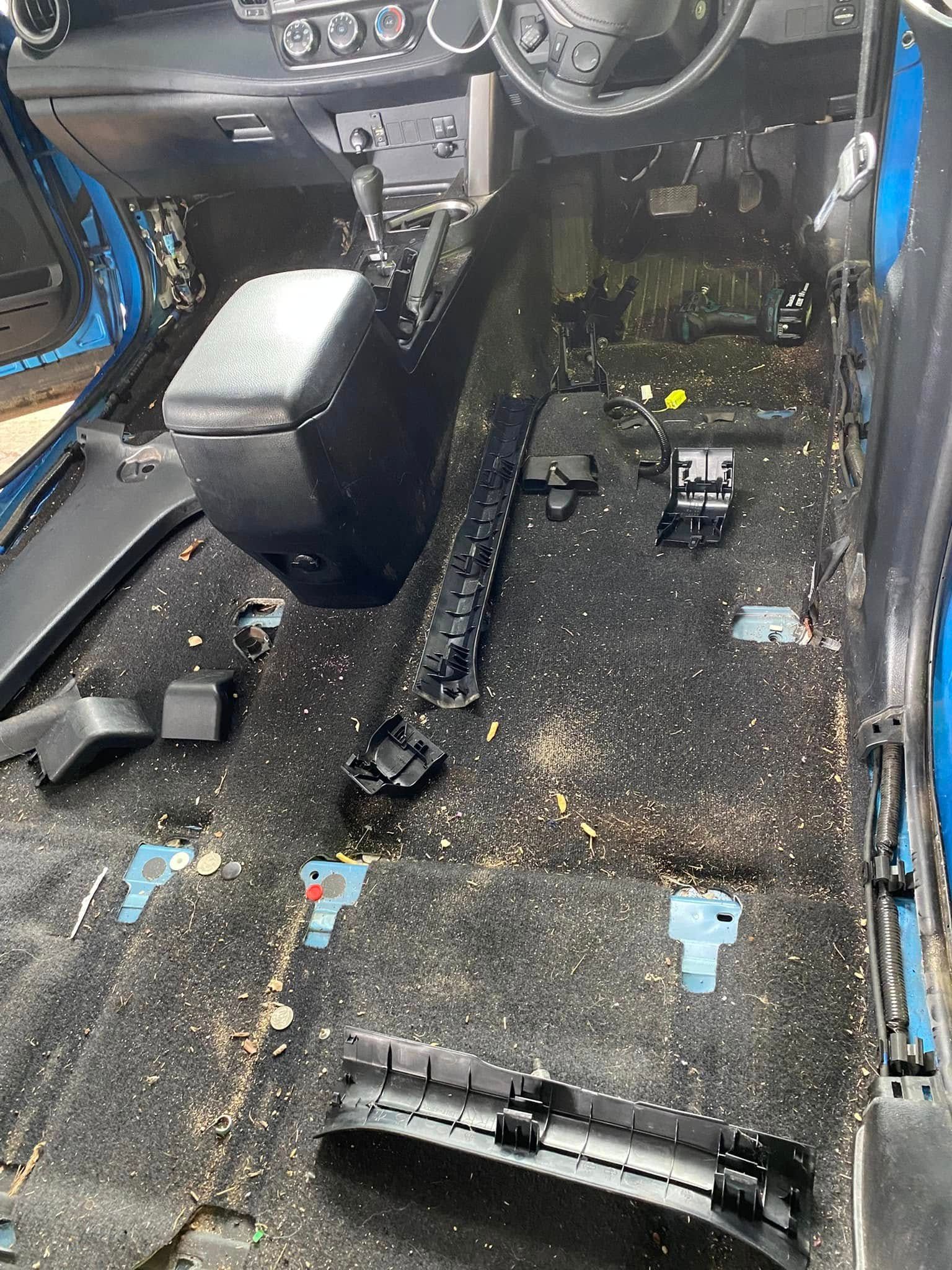 Car Interior with A Dirty, Debris-Covered Floor — Beclean Auto Detailing in Mareeba, QLD