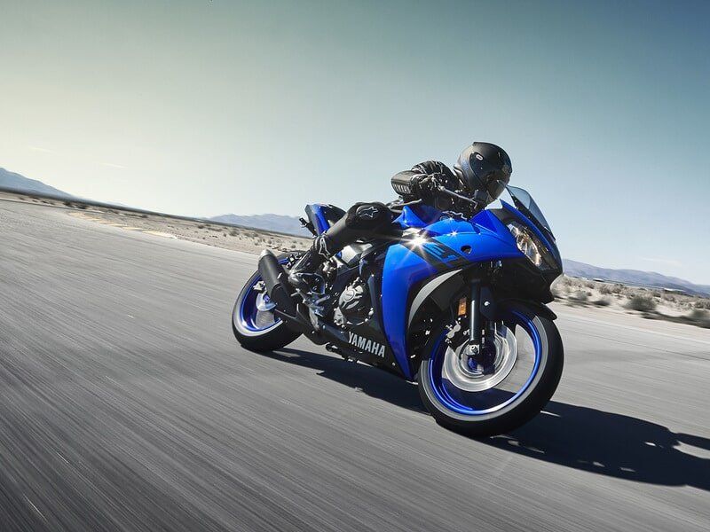Man Riding A Motorcycle In High Speed — Motorcycle Dealer in Berrimah, NT