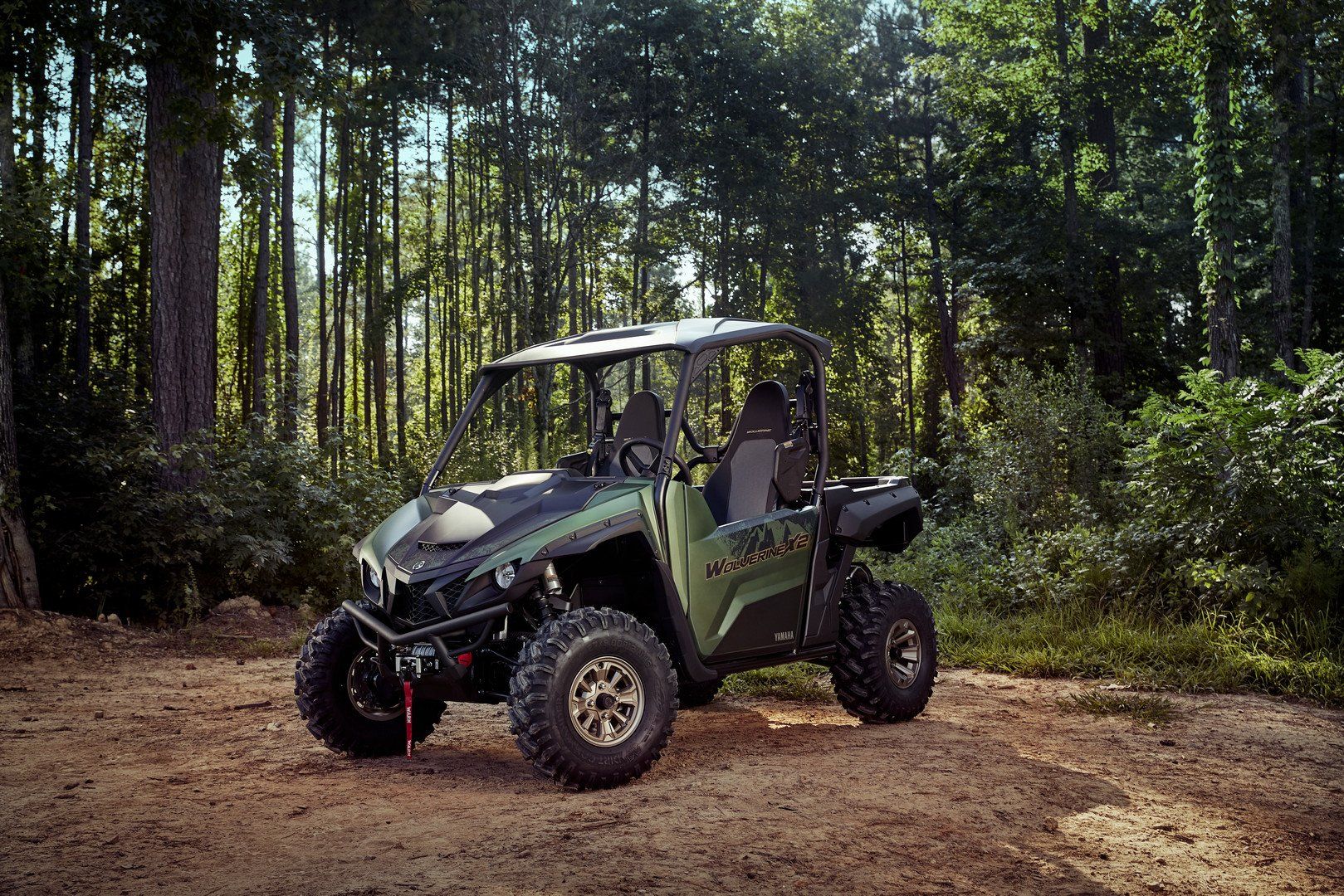 Off-road Vehicle Near Trees — Motorcycle Dealer in Berrimah, NT
