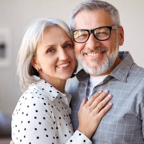 Smiling Adult Couple — Gate City, VA — Wray Chaffin DMD Smiling Adult Couple — Gate City, VA — Wray Chaffin DMD