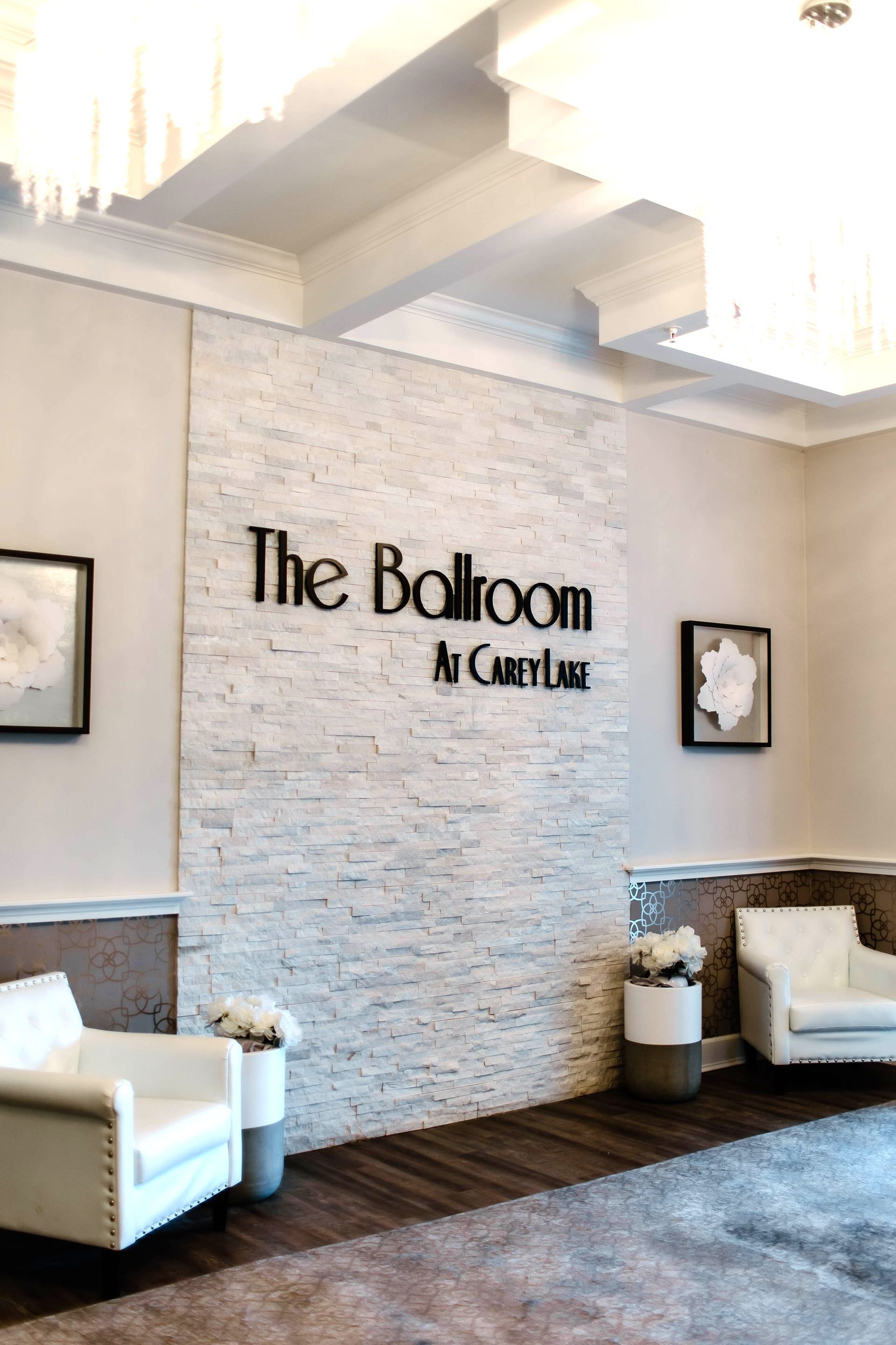 There is a sign on the wall that says `` the ballroom ''.