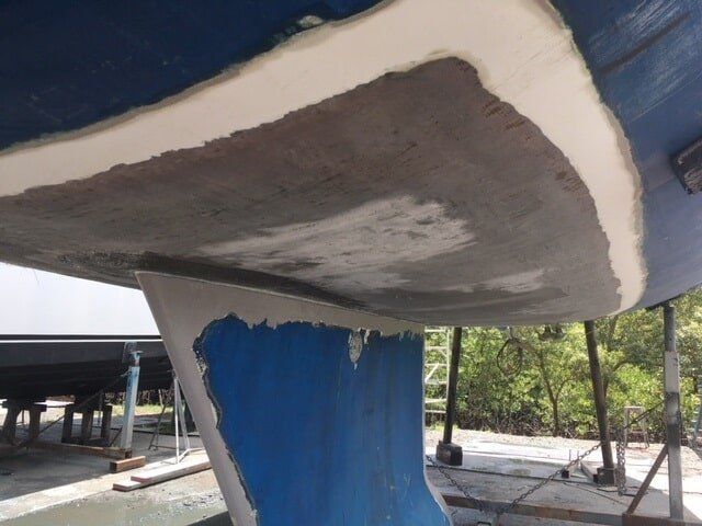 A Blue Boat Is Being Repaired In A Dock  — Edge's Boatyard In Jubilee Pocket, QLD