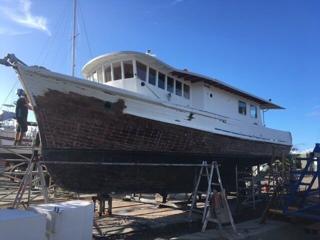 A Large Boat Is Being  Repair In A Marina — Edge's Boatyard In Jubilee Pocket, QLD