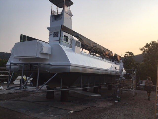 A Large White Boat With A Tower On Top Of It — Edge's Boatyard In Jubilee Pocket, QLD
