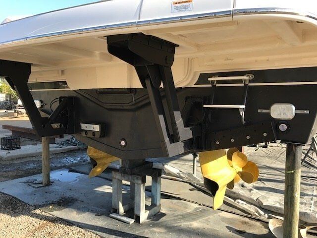 The Underside Of A Boat With A Yellow Propeller — Edge's Boatyard In Jubilee Pocket, QLD