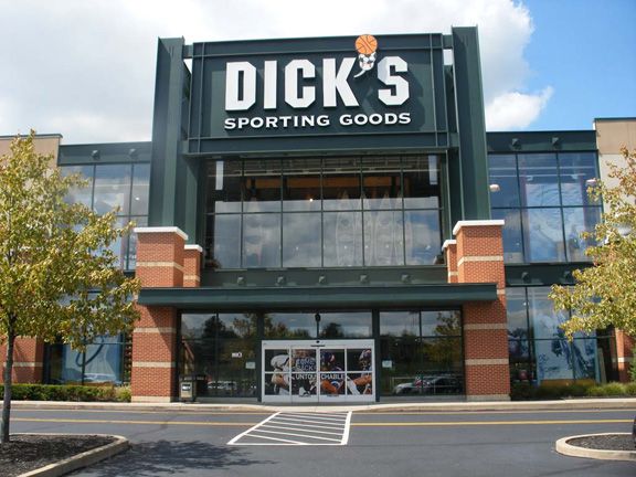 Dick's Sporting Goods store exterior with glass windows and a prominent sign.