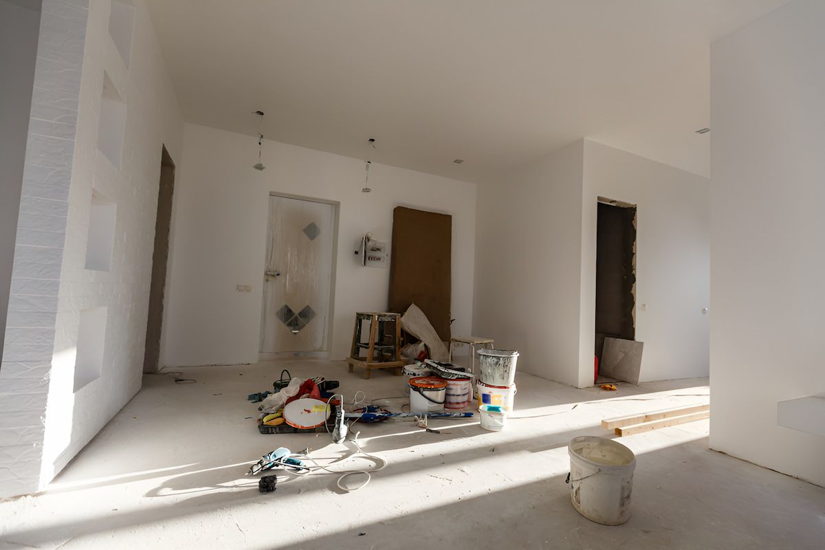 A Room With White Walls And A Lot Of Tools On The Floor — Andrew Pye Painting & Decorating In Gillen, NT