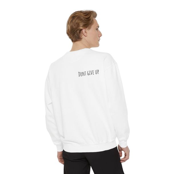 The back of a man wearing a white sweatshirt