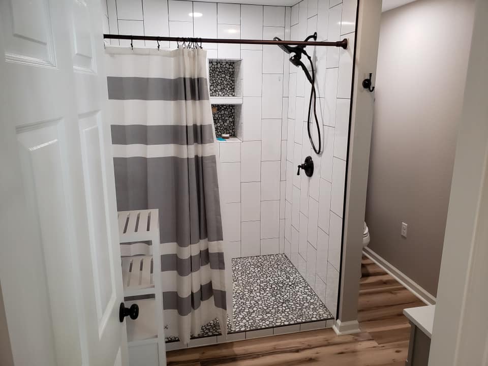 finish tiled shower done by a modern touch