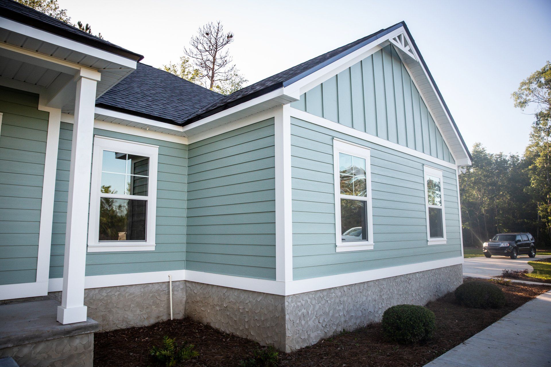 Siding being installed by A Modern Touch