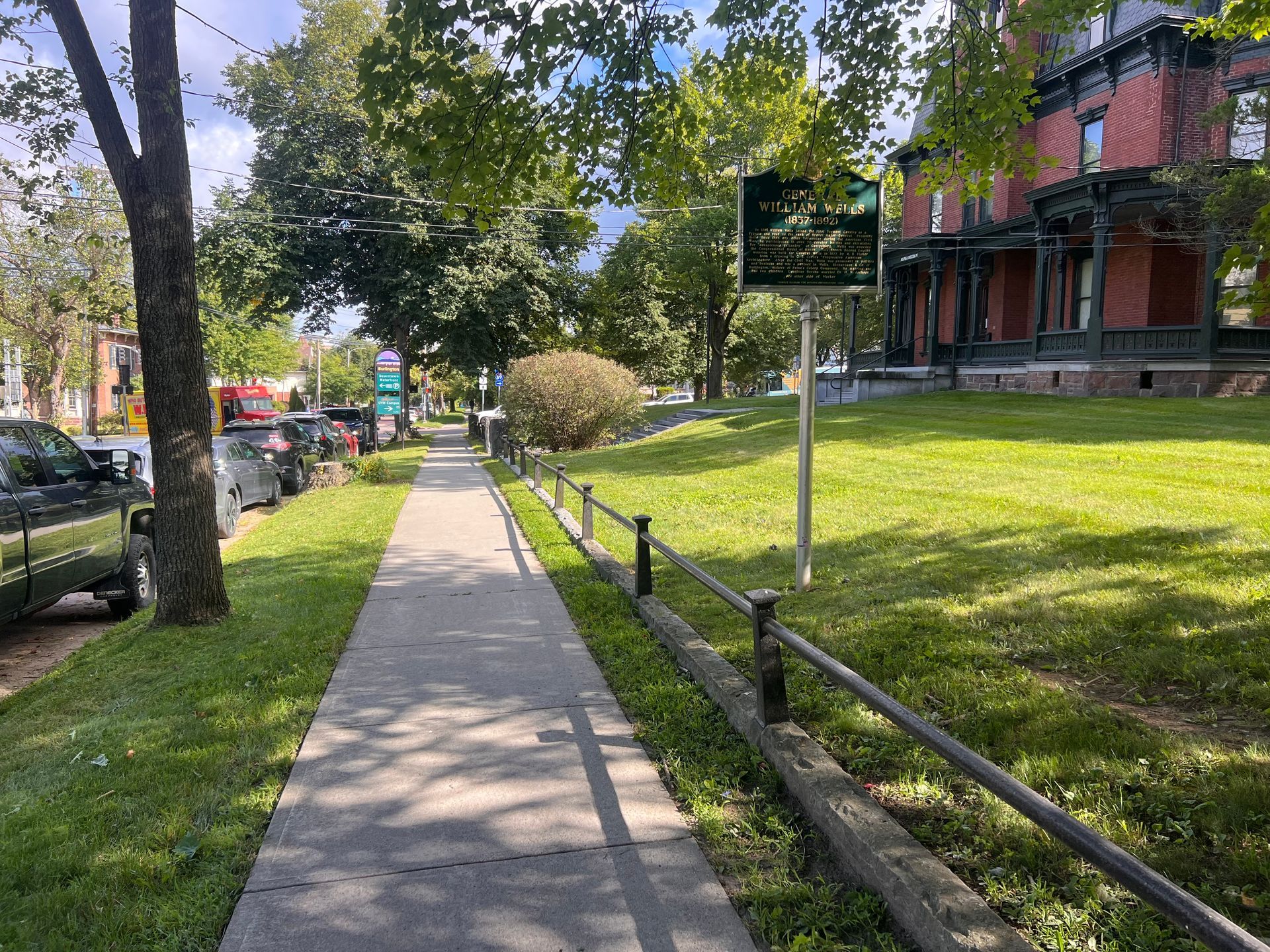 Commercial property exterior with maintained lawn and landscape bed