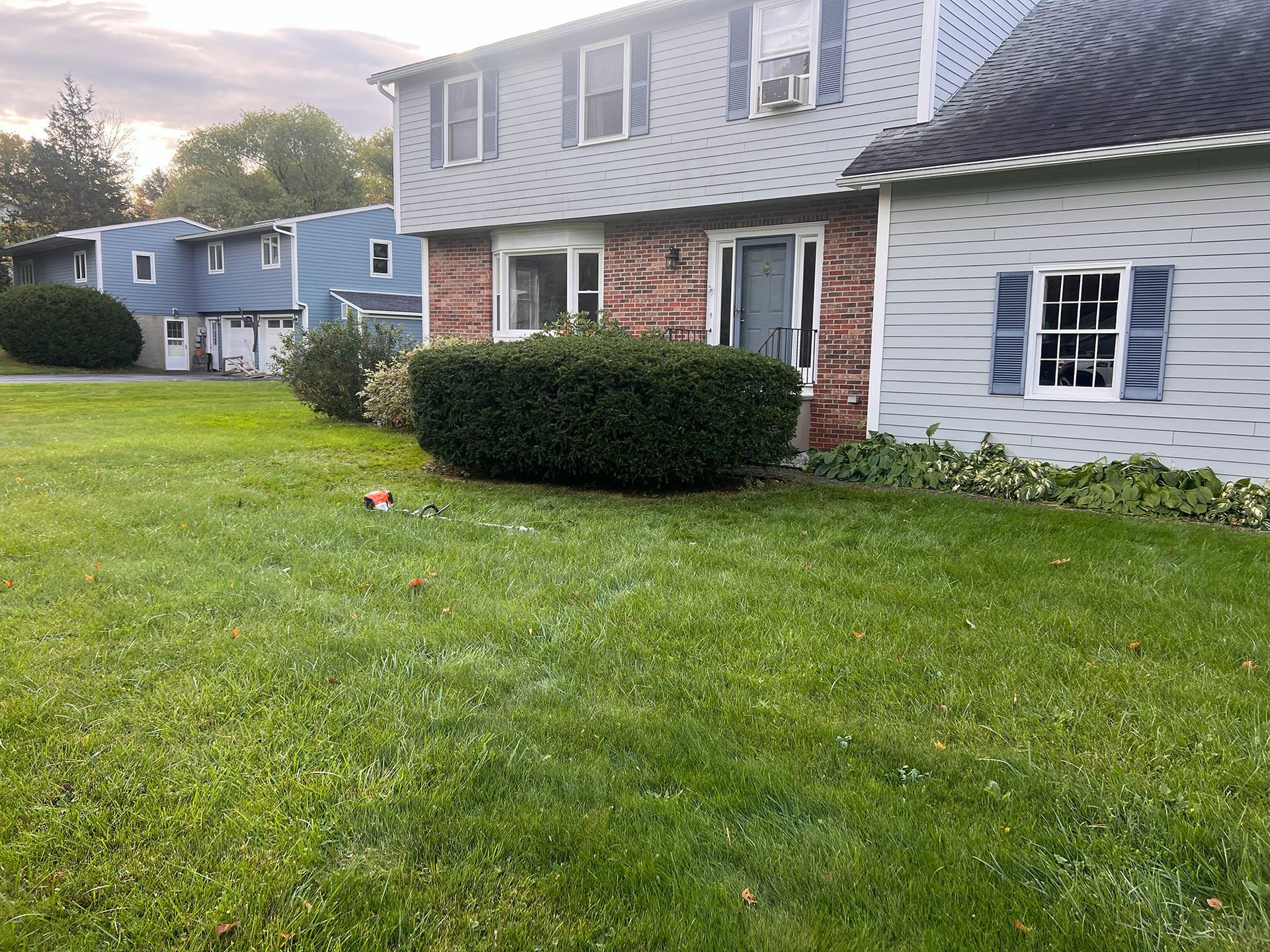 Mowing a green lawn