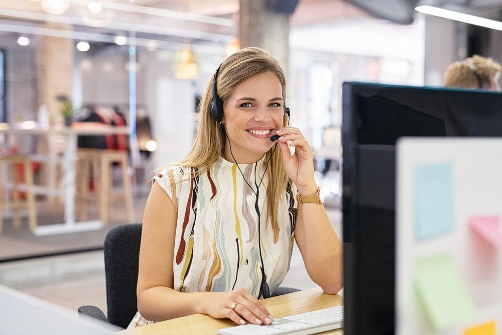 Smiling Customer Support Lady — Health Insurance in Australia