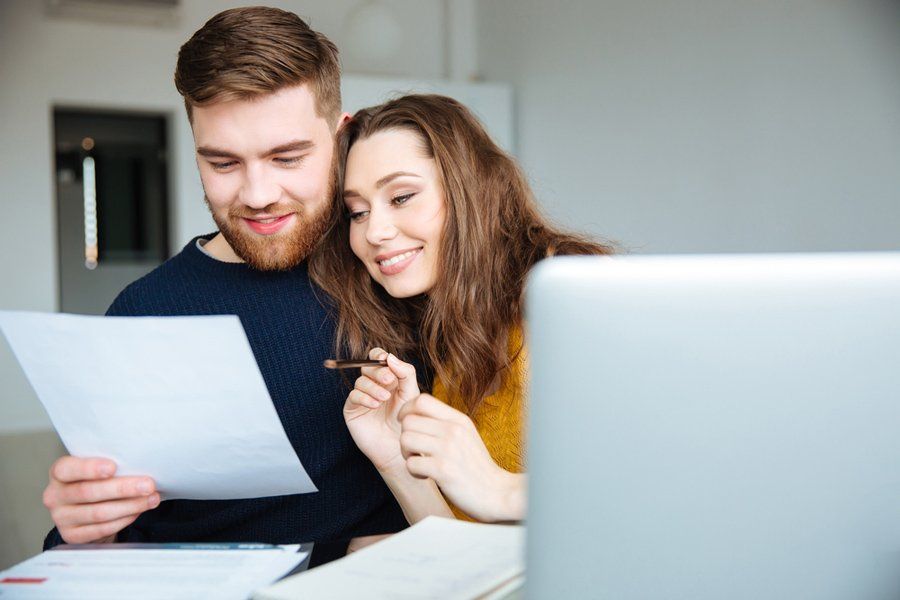 Couple Managing Their Bills — Health Insurance in Australia